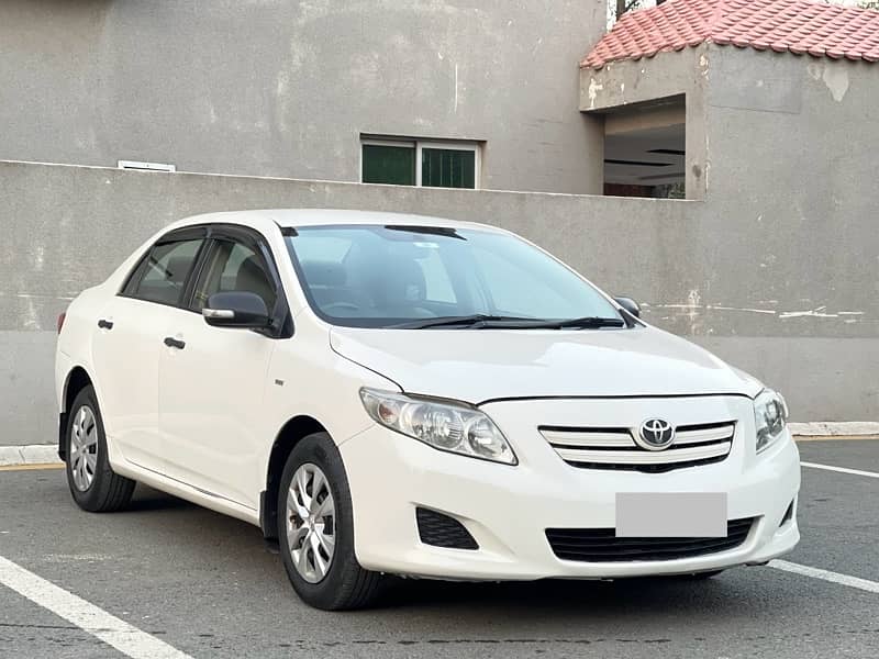 TOYOTA COROLLA 2010 XLi 1.3 VVTi MINT CONDITION WHITE LAHORE REG 2011 3