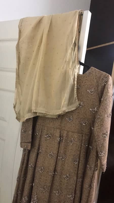 fancy golden stitched three piece frock 1