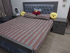 King size bed set with 2 side tables and a dressing table.