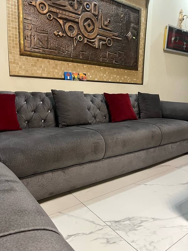 Grey L-shaped sofa 0