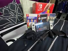 Nintendo Switch OLED (Box, Accessories + 3 Games)