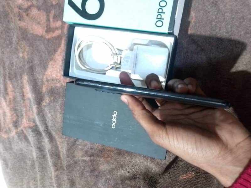 OPPO Reno 6 with box and charger 1