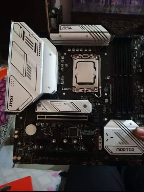 MSI MAG MORTAR WIFI DDR5 GAMING MOTHERBOARD 0