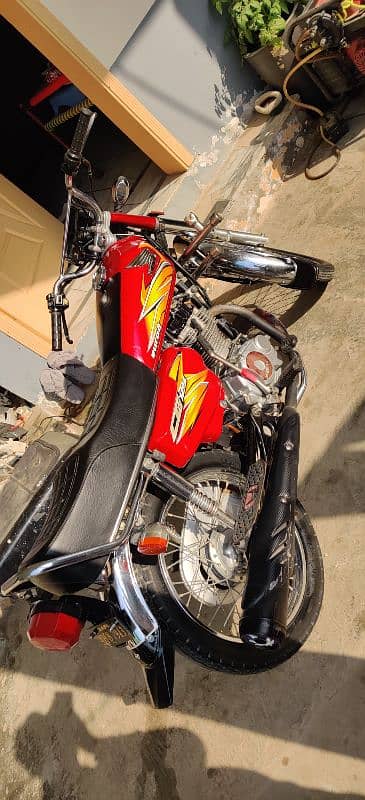 Honda 125 good condition all Punjab number 7