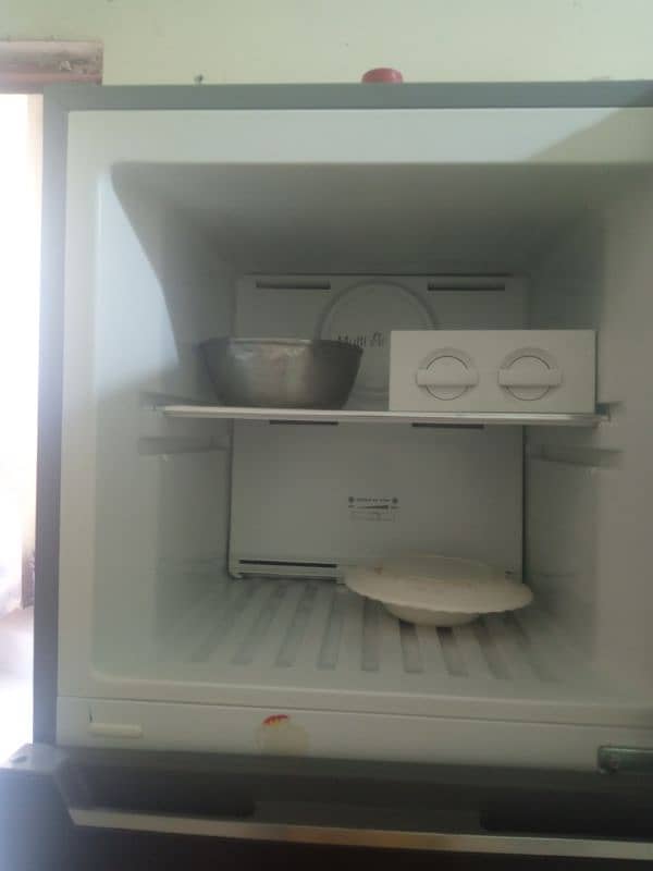 saudia fridge 1 year use . . . . new condition 1