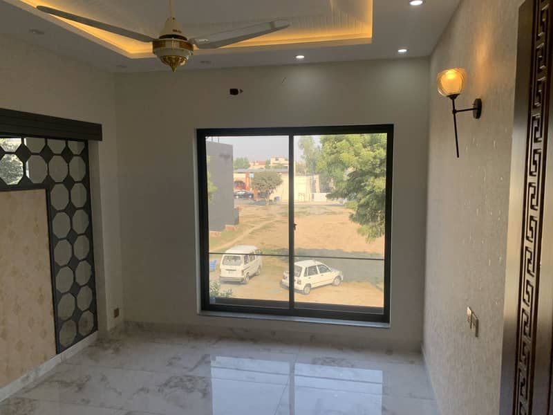 10 MARLA HOUSE ON "50" FEET WIDE ROAD BRAND NEW WOW LOCATION OF DHA PHASE 11 RAHBAR SECTOR 1 IS AVAILABLE FOR SALE 44