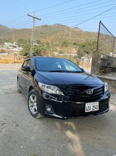 Toyota Corolla 2010 xli convert Gli lahore number 03165994109