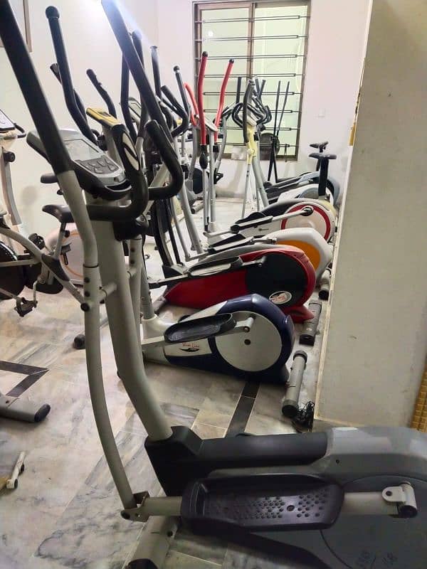 exercise cycle elliptical cross trainer back seated bike spin bike 0