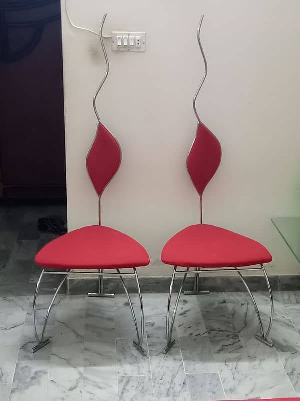 Two stylish red chairs 0