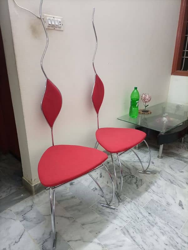 Two stylish red chairs 1