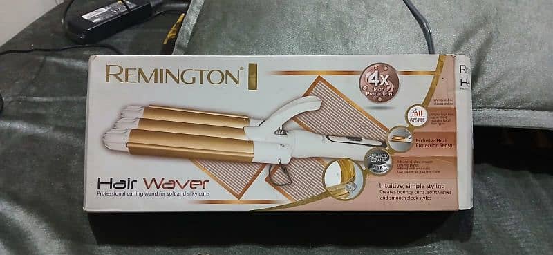 Remington hair waver 4in one 10by10 with box 5