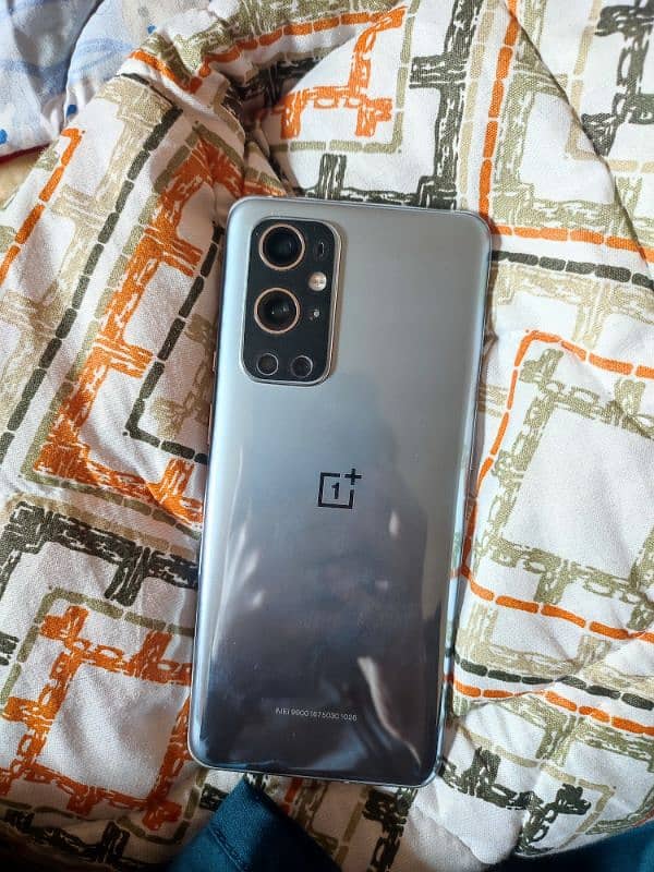 Oneplus 9Pro 12 256 Silver Color Full Lush condition with minor Shahes 0