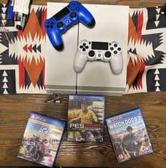 PS4 WITH 2 ORIGINAL CONTROLLERS AND GAMES