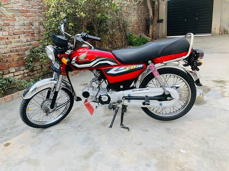 honda 70 first owner  drive only 8000 km 1