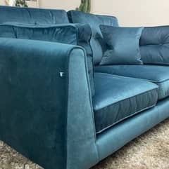 sofa clothe in teal color