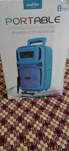 Portable speaker with karaoke