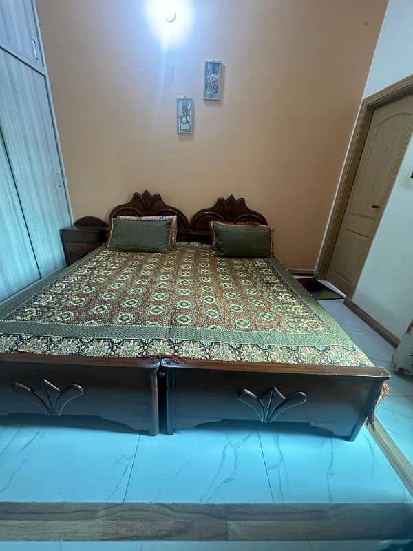 Double wooden bed for sale 1