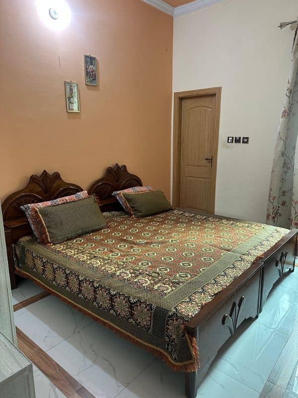 Double wooden bed for sale 0