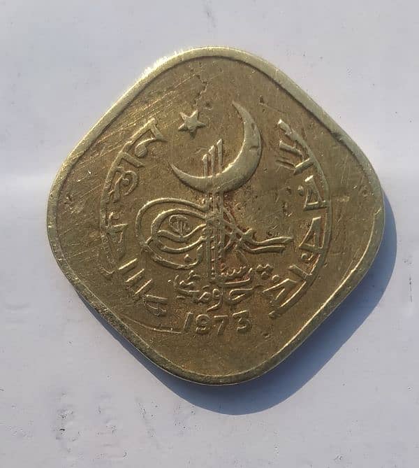 This is a 5 Paisa coin from Pakistan, minted in 1973. 0