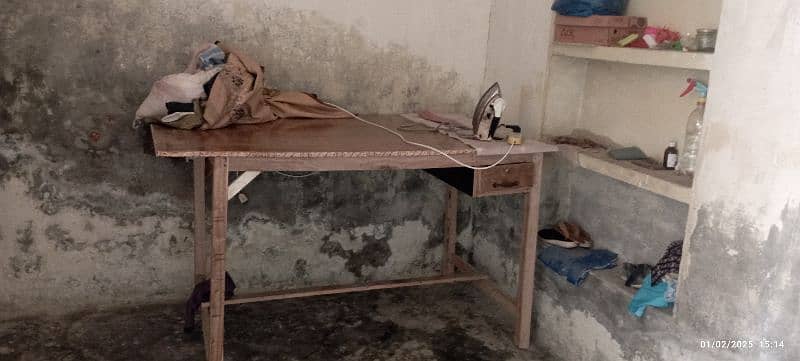 cutting table for tailors/iron stand for dry cleaners. 2