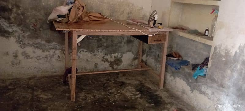 cutting table for tailors/iron stand for dry cleaners. 3