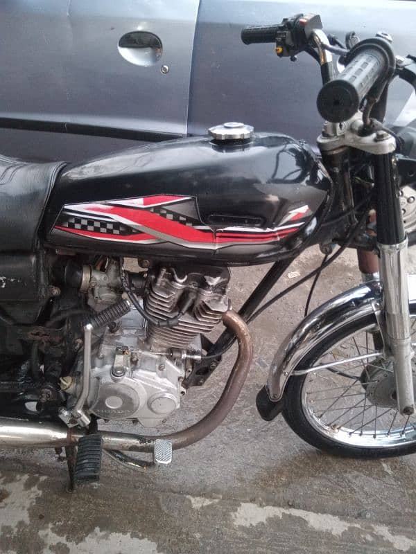 well maintained honda 125 ready for derive 2