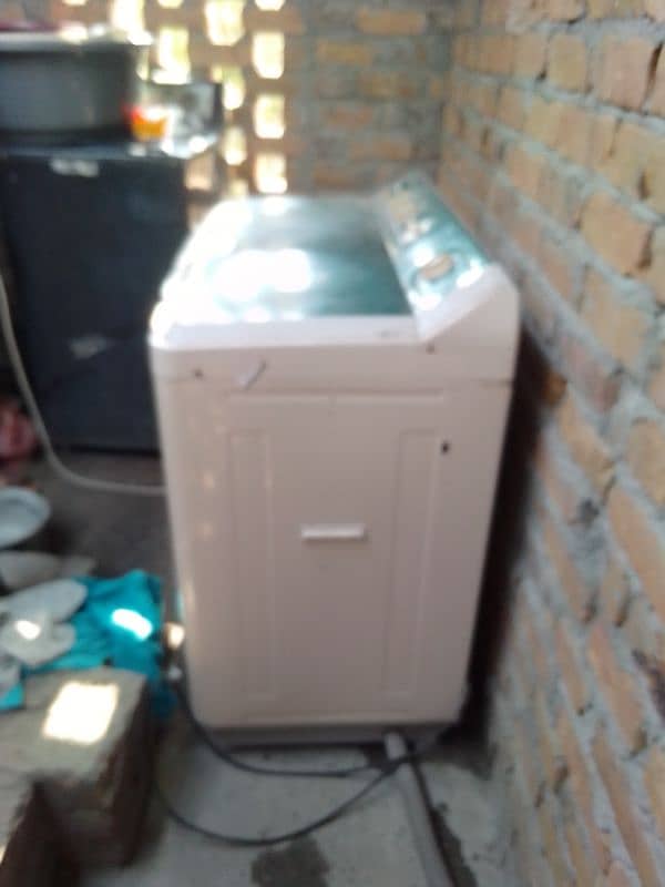 Haier Washing & Dyer Machine 4