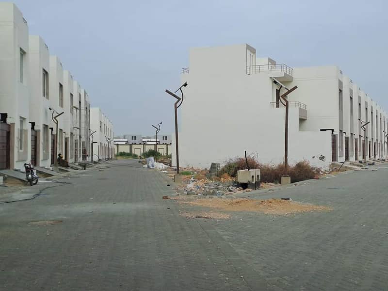 Corner vila for sale at palm village area 200 square yards near main boulevard road and main gate 17