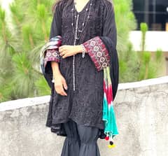 Black pearl shirt with ghraara, bell trouser with dyed dopatta .