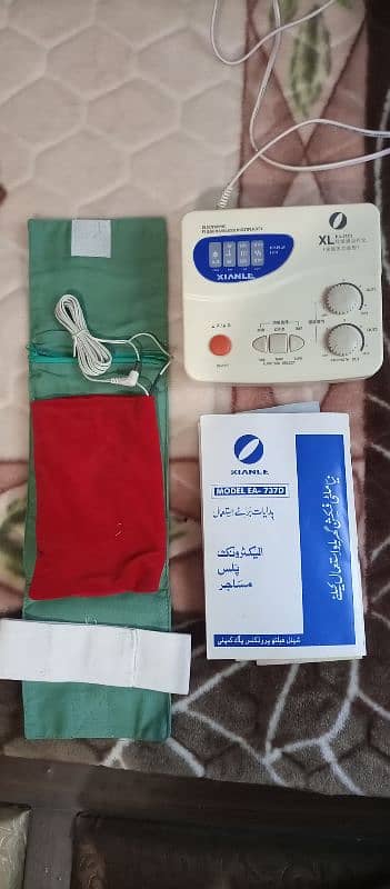 Electronic Pulse Massager 4