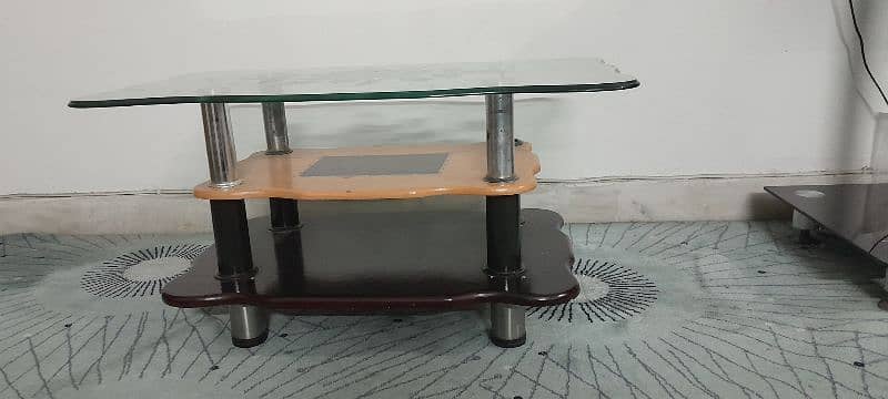 2 glass & wood side tables for sale (7000 Rs for both) 2