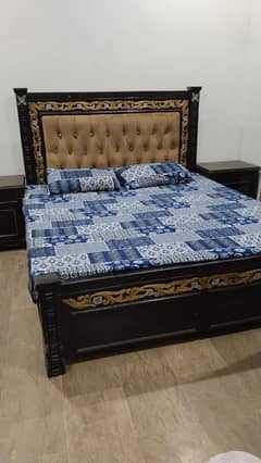 King size bed set with 2 side tables and a dressing table