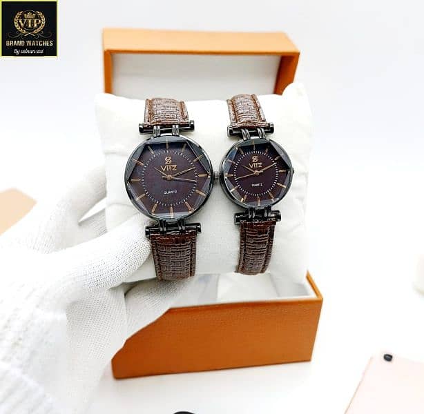 COUPLE WATCHES   GOOD LOOKING DAIL  GOOD QUALITY 1