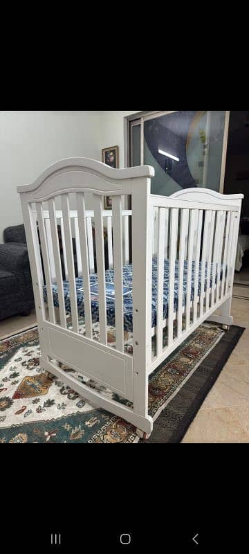 2 crib, 1 dining seat, 1 baby available for sale 2