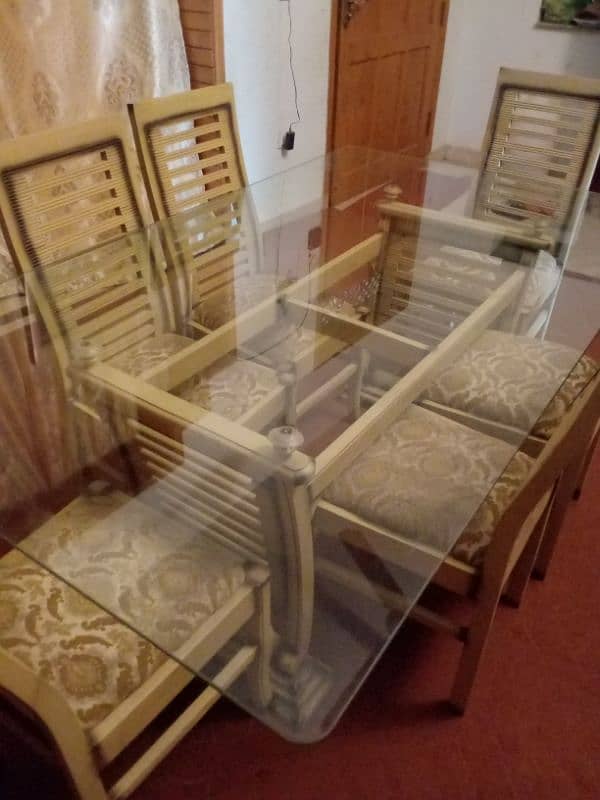 Dining Table with six chairs and glass top 1