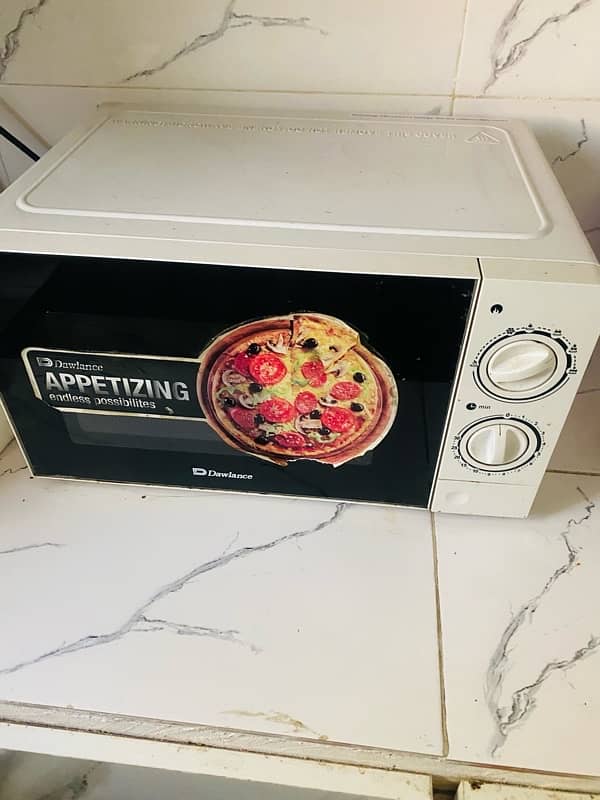 Used Microwave oven in good condition 1