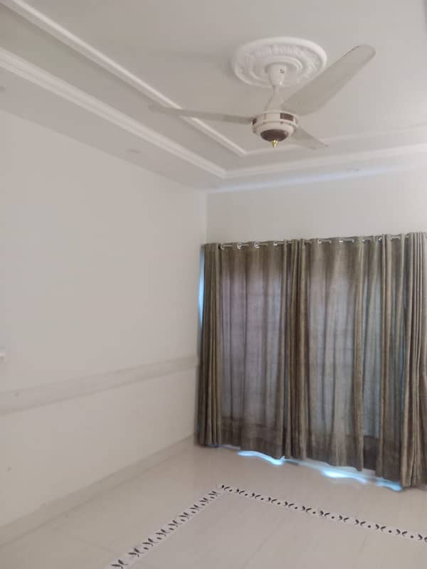 Kanal 4bed outclass upper portion is for rent in wapda town 2