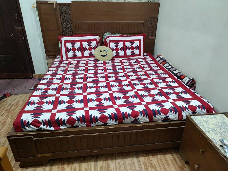 King size bed with side tables and dressing tables and lamp 0