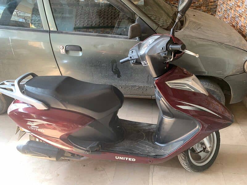 united scooty with 100cc 1