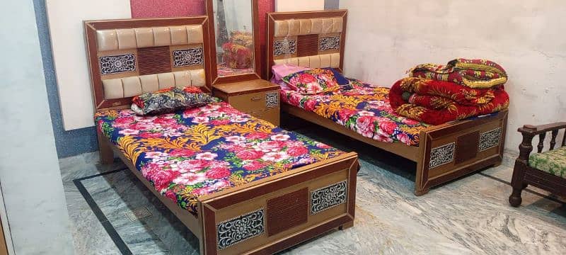 two bed set with table 0