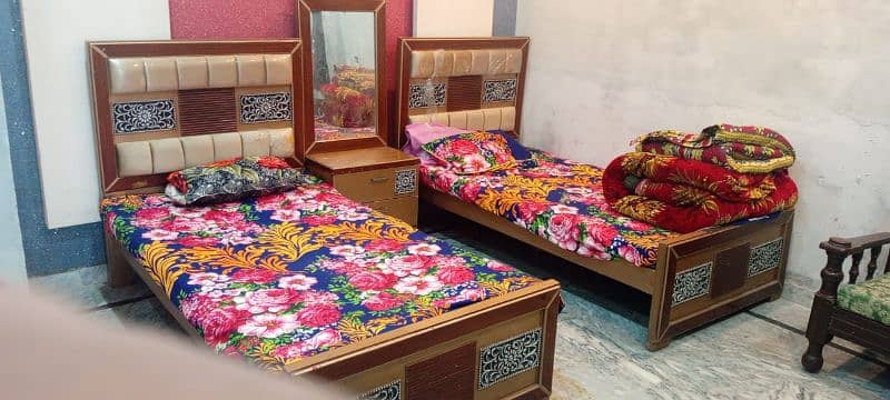 two bed set with table 1