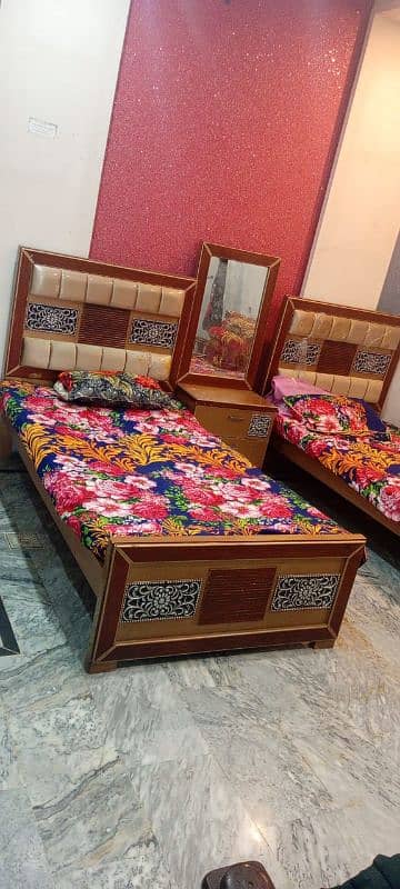 two bed set with table 4