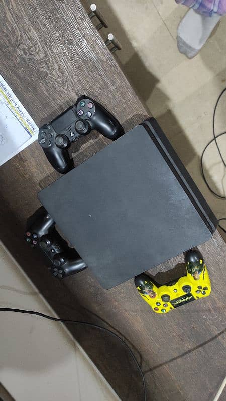 Ps4 with games and controllers 1