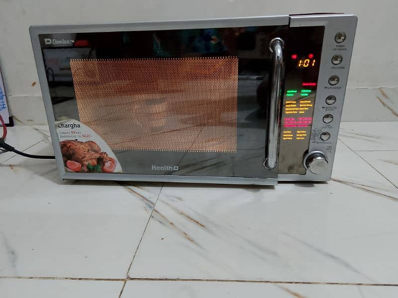 Dawlance microwave oven 2 in 1 grill + microwave 1