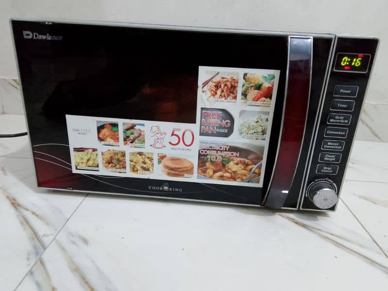 Dawlance 3 in 1 grill baking microwave oven neat and clean condition 0