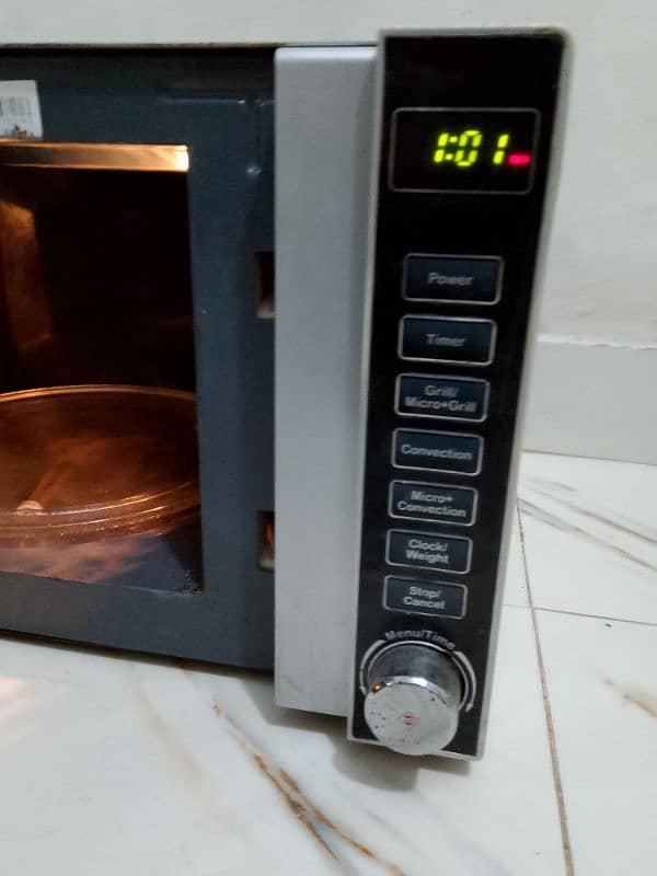 Dawlance 3 in 1 grill baking microwave oven neat and clean condition 7