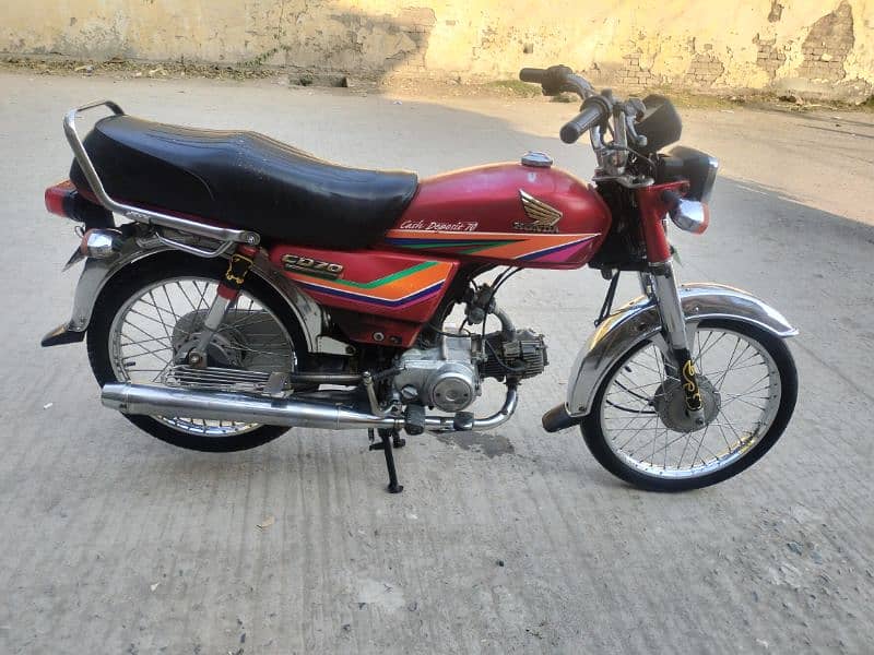 Honda CD 70 model 2012 Islamabad number 03341511728 1