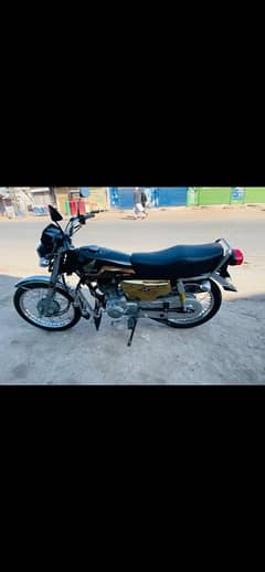 Honda 125SE Gold edition