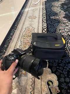 NIKON D5200 in new condition with lens 18-140 mm