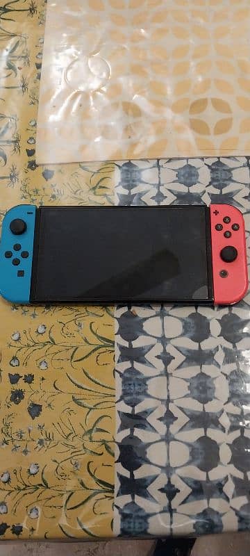 nintendo switch oled only used for one year. Good price 1